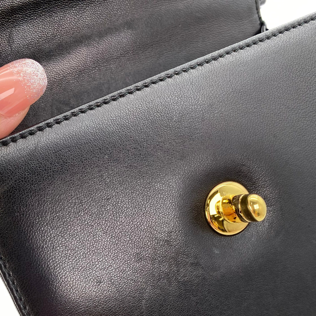 Makoto, 4 Series Turnlock Black Lambskin with seal and card