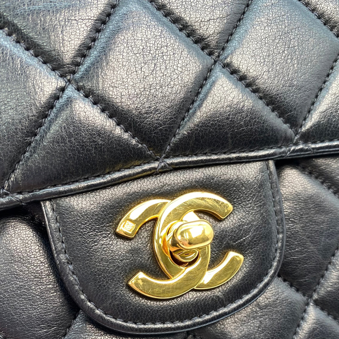 Eito, 4 Series Medium Single Flap Black Lambskin with seal and card
