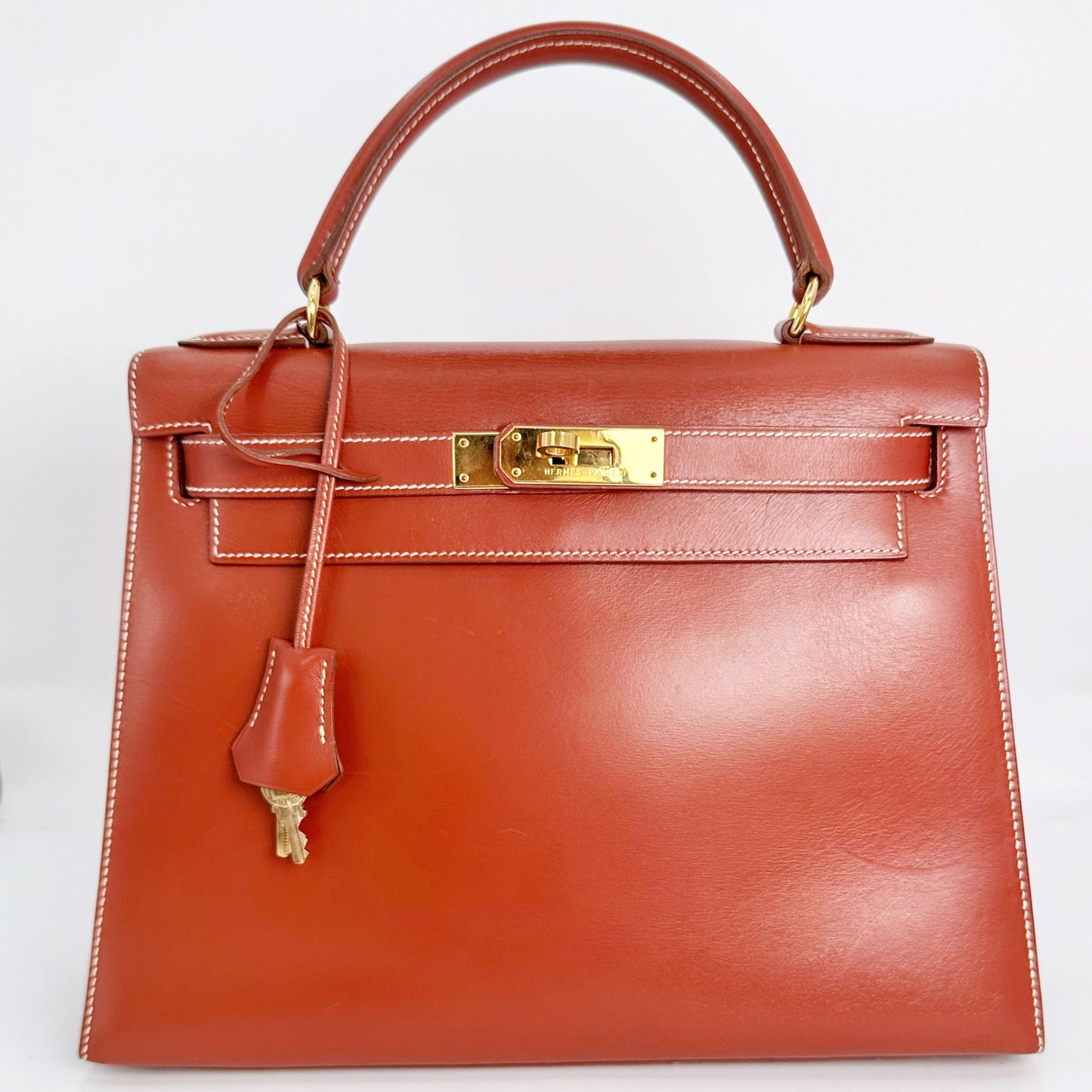 Shernice, Vintage Authentic Hermes ⭕X 1994 kelly 28 sellier quilting brique box bag GHW with strap, key and clochette