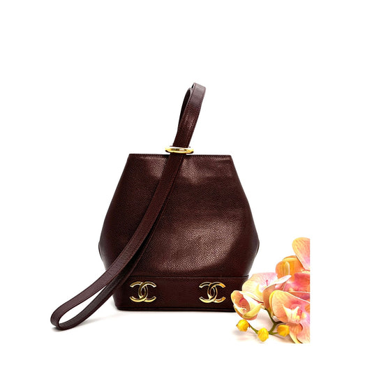 Tripp, 3 Series Brown caviar bucket bag with seal and card