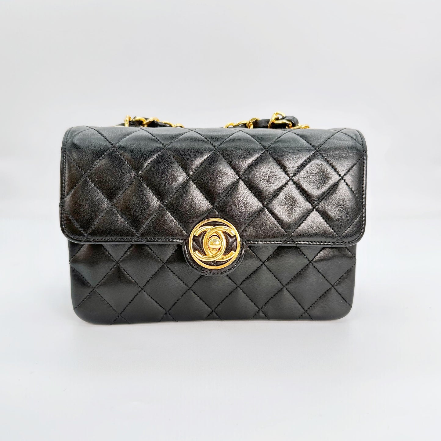 Chinatsu, Vintage Authentic Chanel 1 series mini matelasse black lambskin with seal and card