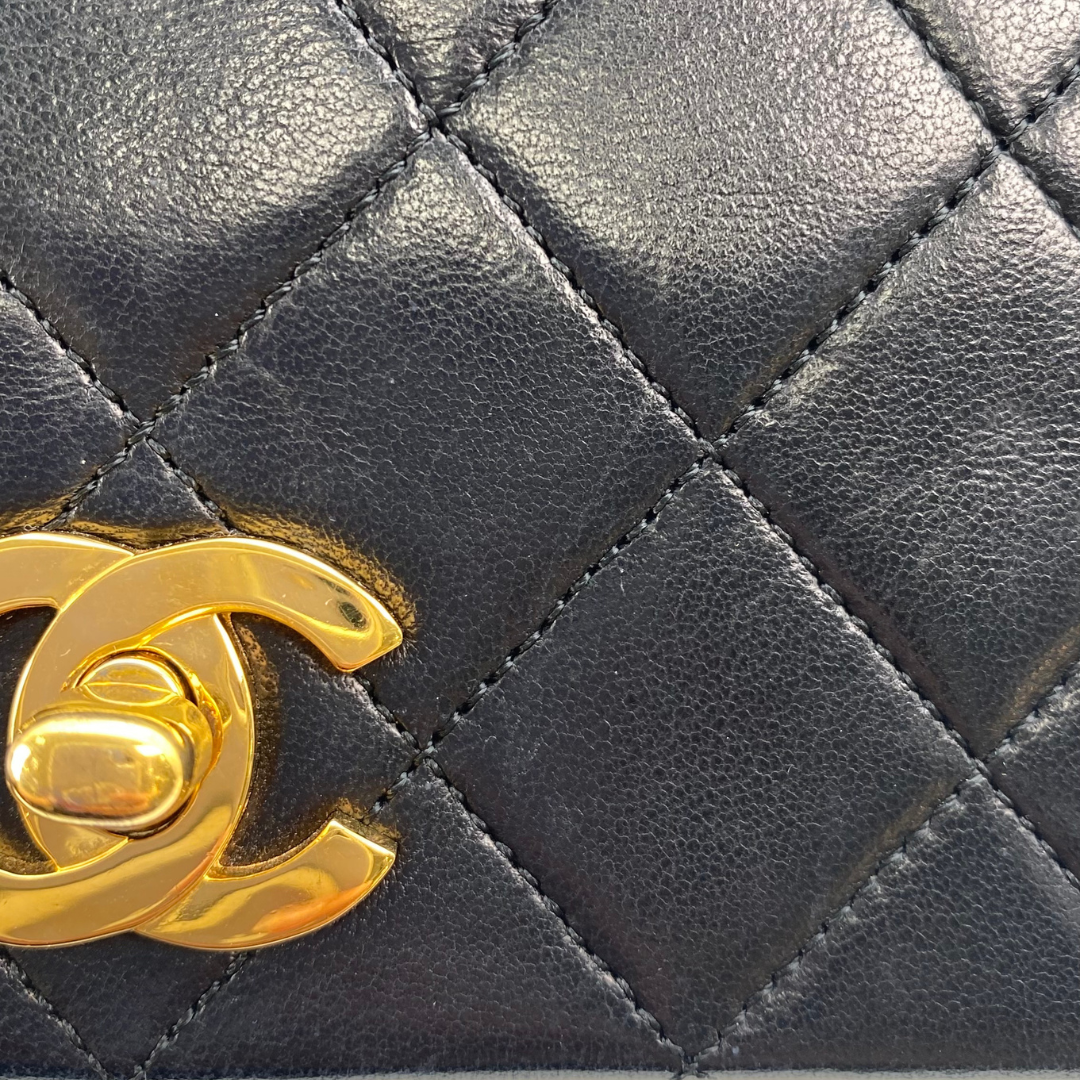 Evadne, 1 Series Small Full Flap Black Lambskin with seal and card