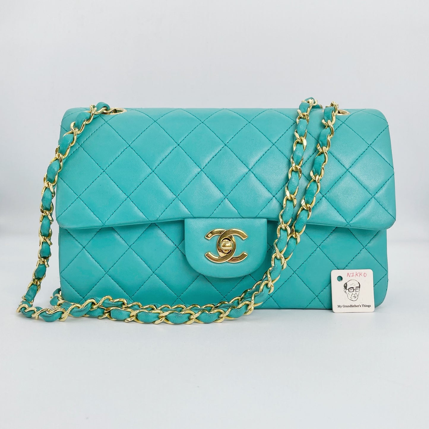 Nikko, Vintage Authentic Chanel 1 series small classic flap turquoise lambskin with seal