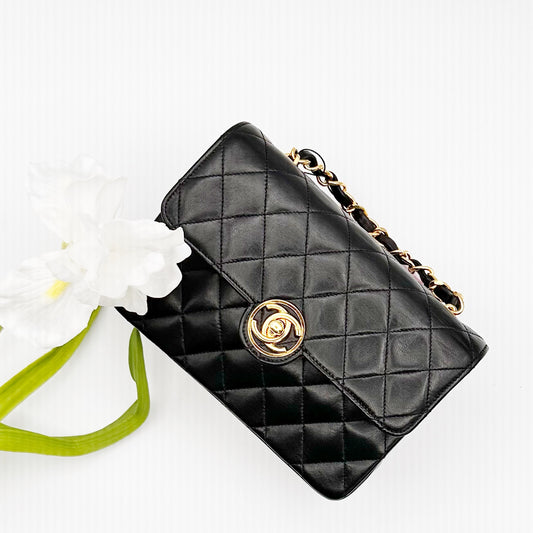 Chinatsu, Vintage Authentic Chanel 1 series mini matelasse black lambskin with seal and card