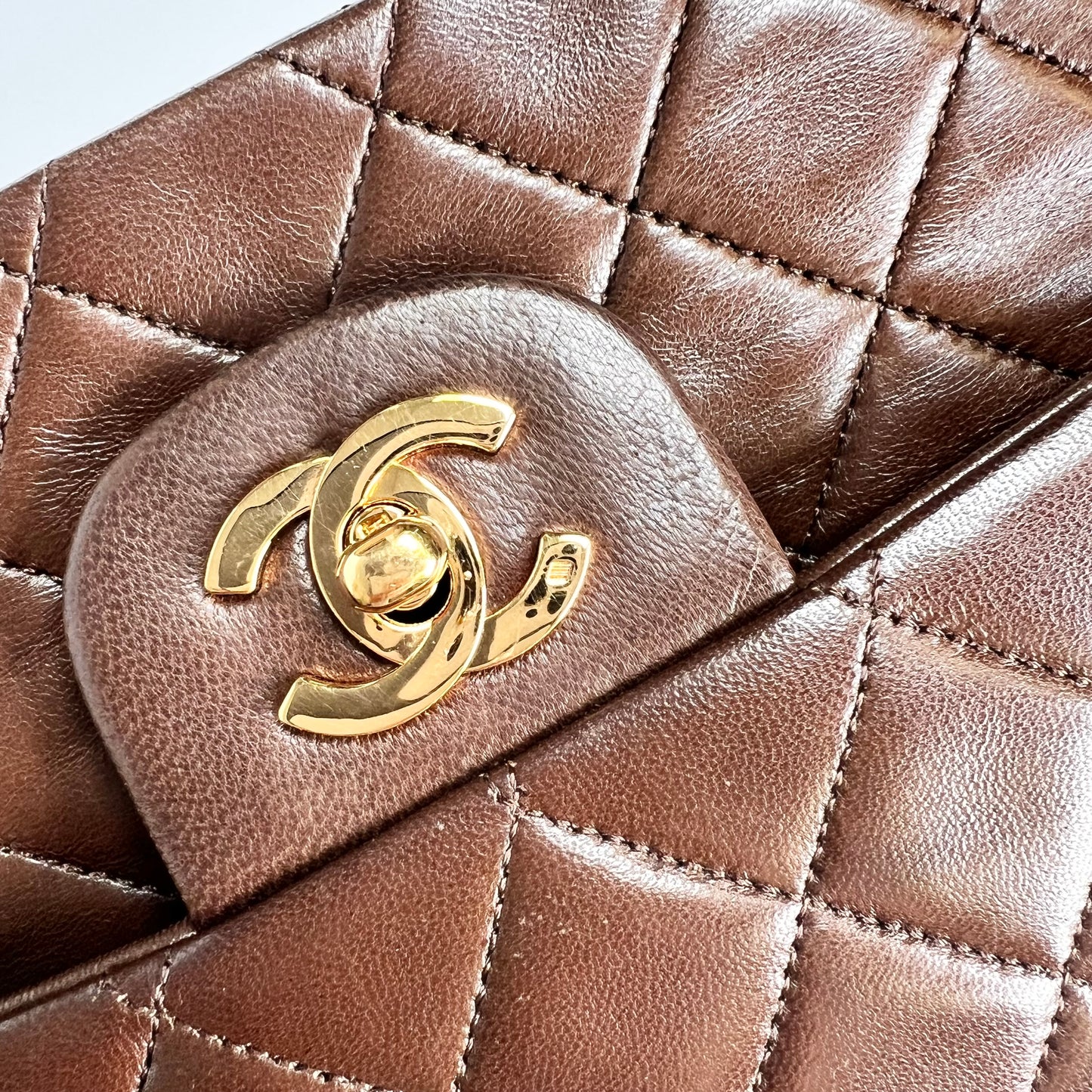 Bracha, Vintage Authentic Chanel 1 series medium brown lambskin classic flap with seal and card