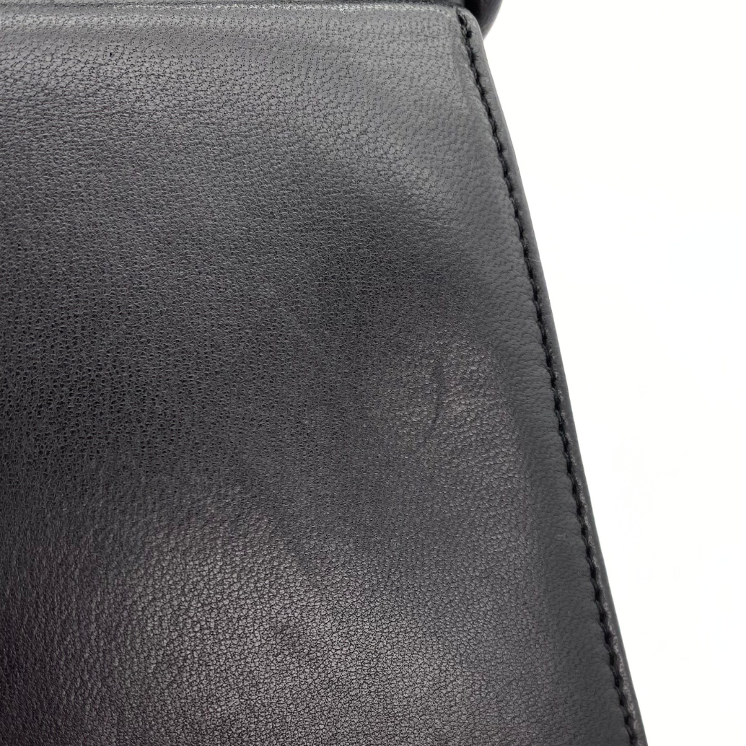 Makoto, 4 Series Turnlock Black Lambskin with seal and card