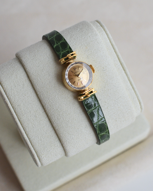 Rolex Orchid 18k w/ green strap
