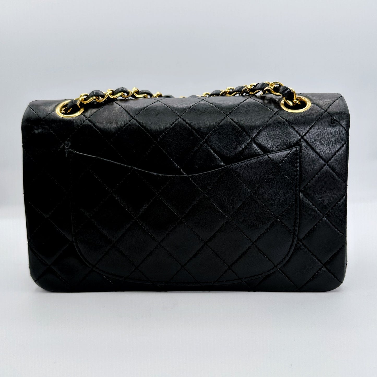 Coleman, Vintage Authentic Chanel 1 series small classic flap black lambskin with seal and card