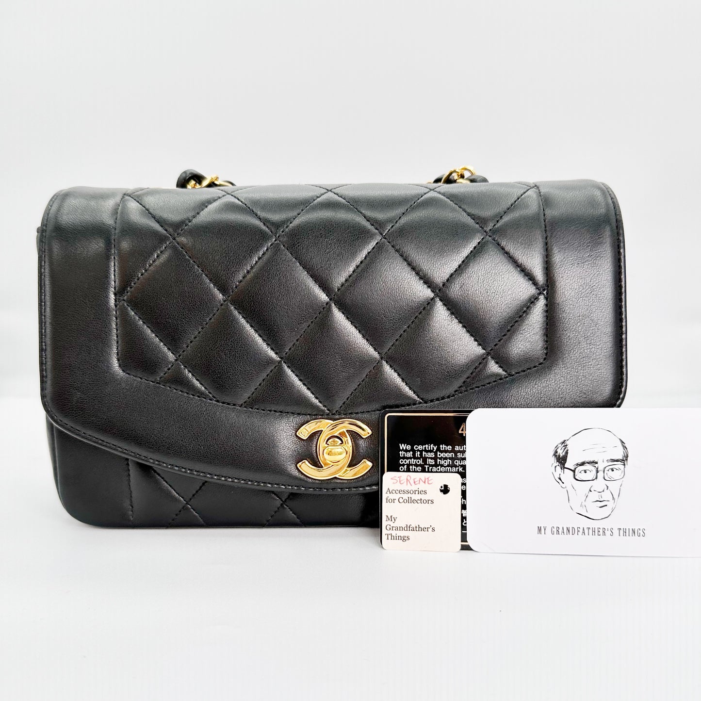 Serene, Vintage Authentic Chanel 4 series small black lambskin diana with seal and card