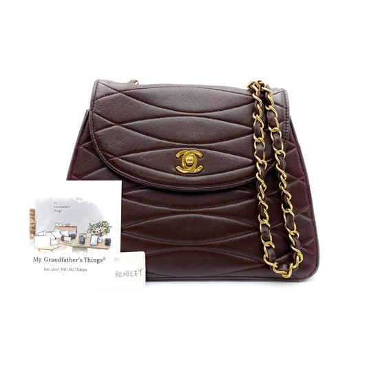 Kensley, Vintage Authentic Chanel 1 series chain brown lambskin with seal and card
