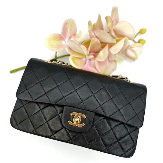 Coleman, Vintage Authentic Chanel 1 series small classic flap black lambskin with seal and card