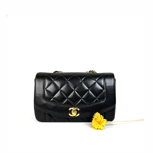 Miranda Sr, Vintage Authentic Chanel 2 series small black lambskin diana with seal only