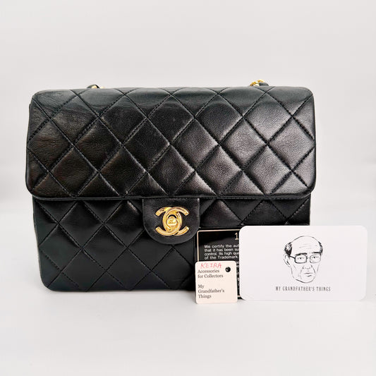 Keira, Vintage Authentic Chanel 1 series 20cm square mini black lambskin with seal and card