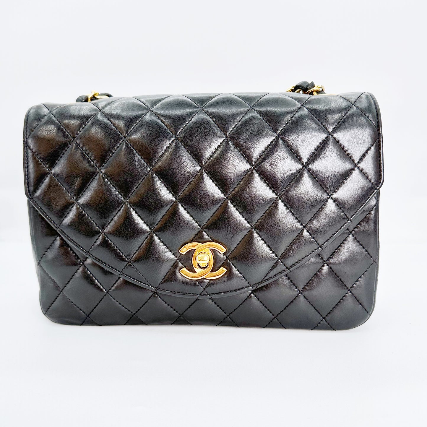 Anzu, Vintage Authentic Chanel 0 series half moon black lambskin with seal