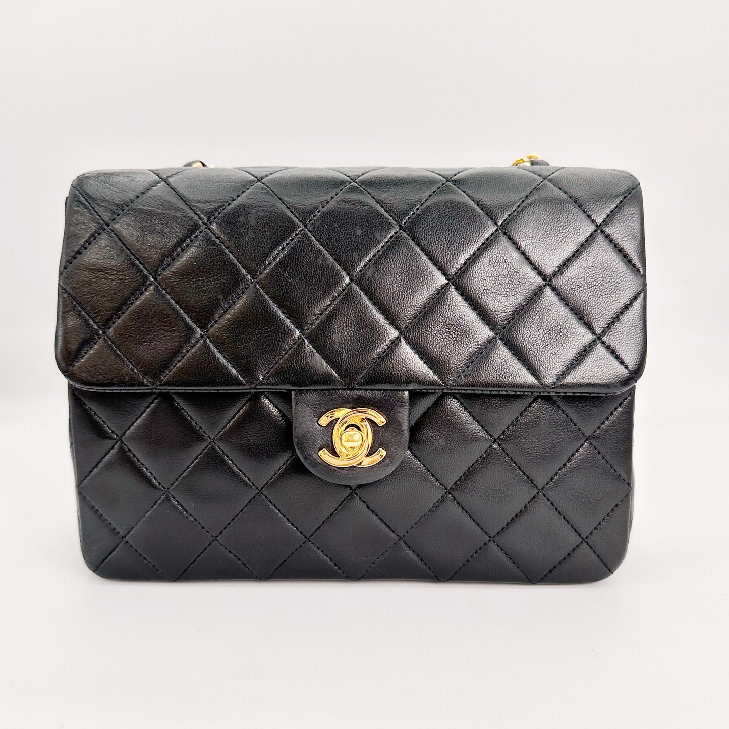 Keira, Vintage Authentic Chanel 1 series 20cm square mini black lambskin with seal and card