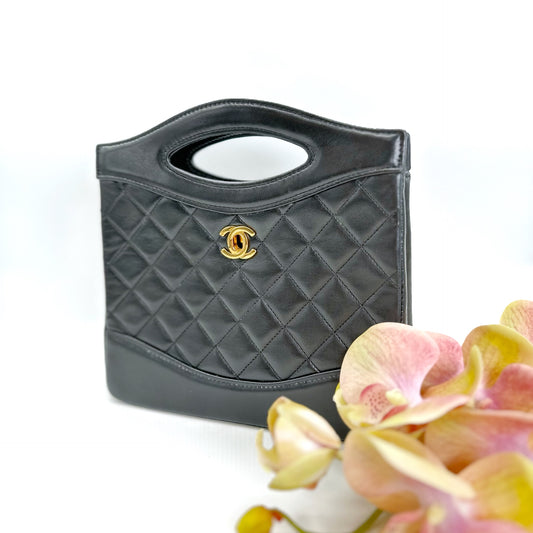 Hopia, Vintage Authentic Chanel 1 series mini 31 black lambskin with seal and card