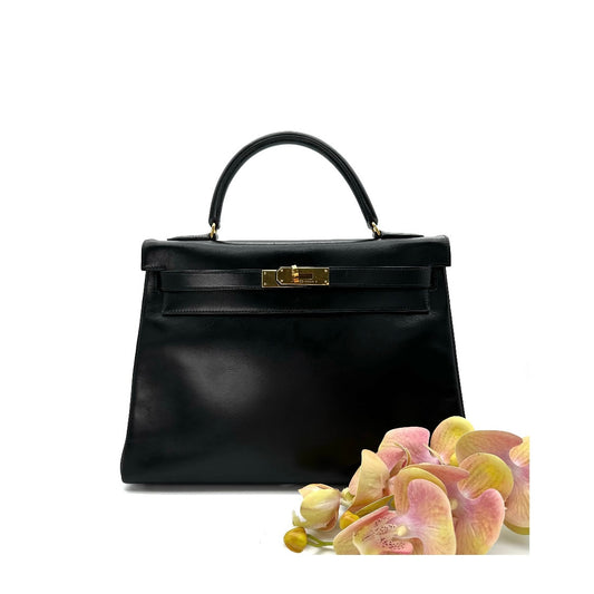 Nisa, 1991 Kelly 32 Retourne Black Boxcalf with stamp 〇U