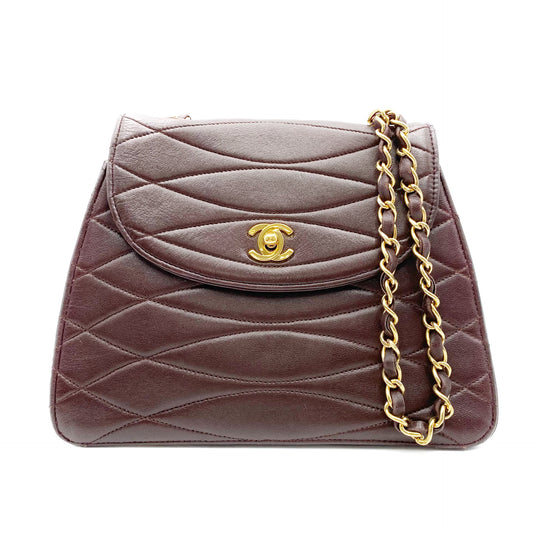 Kensley, Vintage Authentic Chanel 1 series chain brown lambskin with seal and card