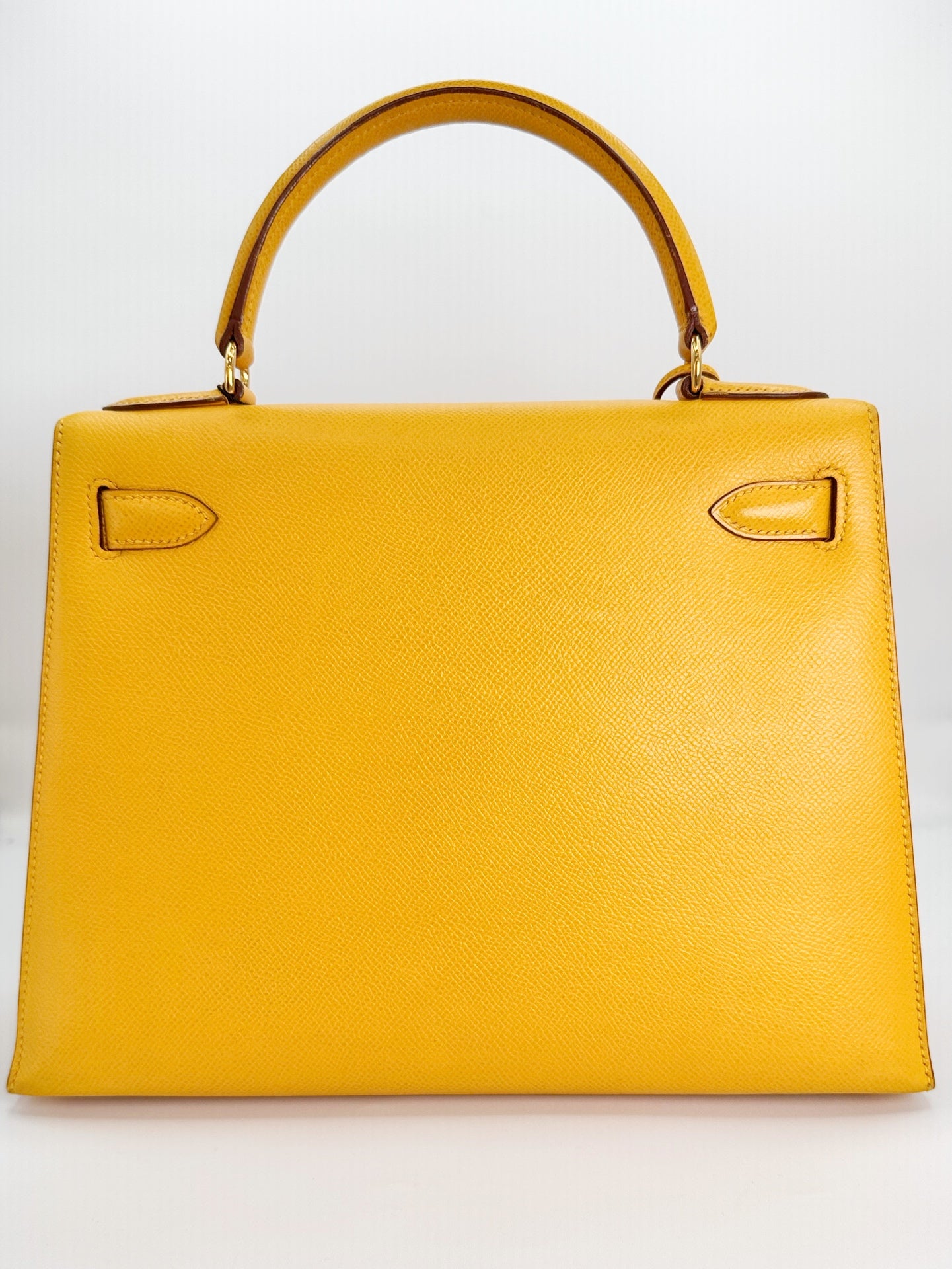 Emily, Vintage Authentic Hermes ⭕X 1994 kelly 28 sellier stitching jaune courchevel leather with strap, chain, clochette, and key