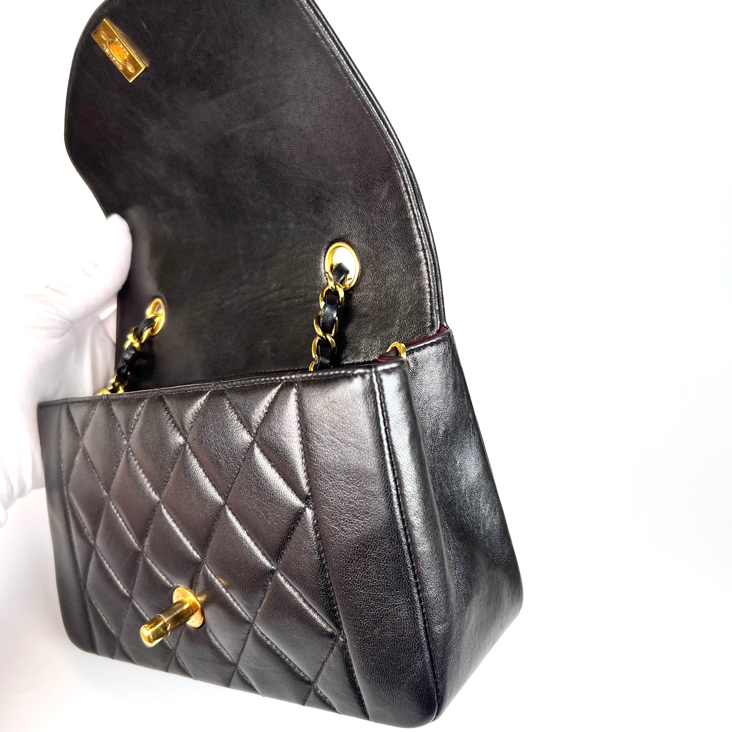 Miranda Sr, Vintage Authentic Chanel 2 series small black lambskin diana with seal only