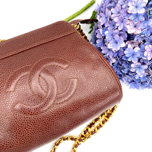 Eljayne, Vintage Authentic Chanel 5 series mini brown caviar "dumpling" with seal and card