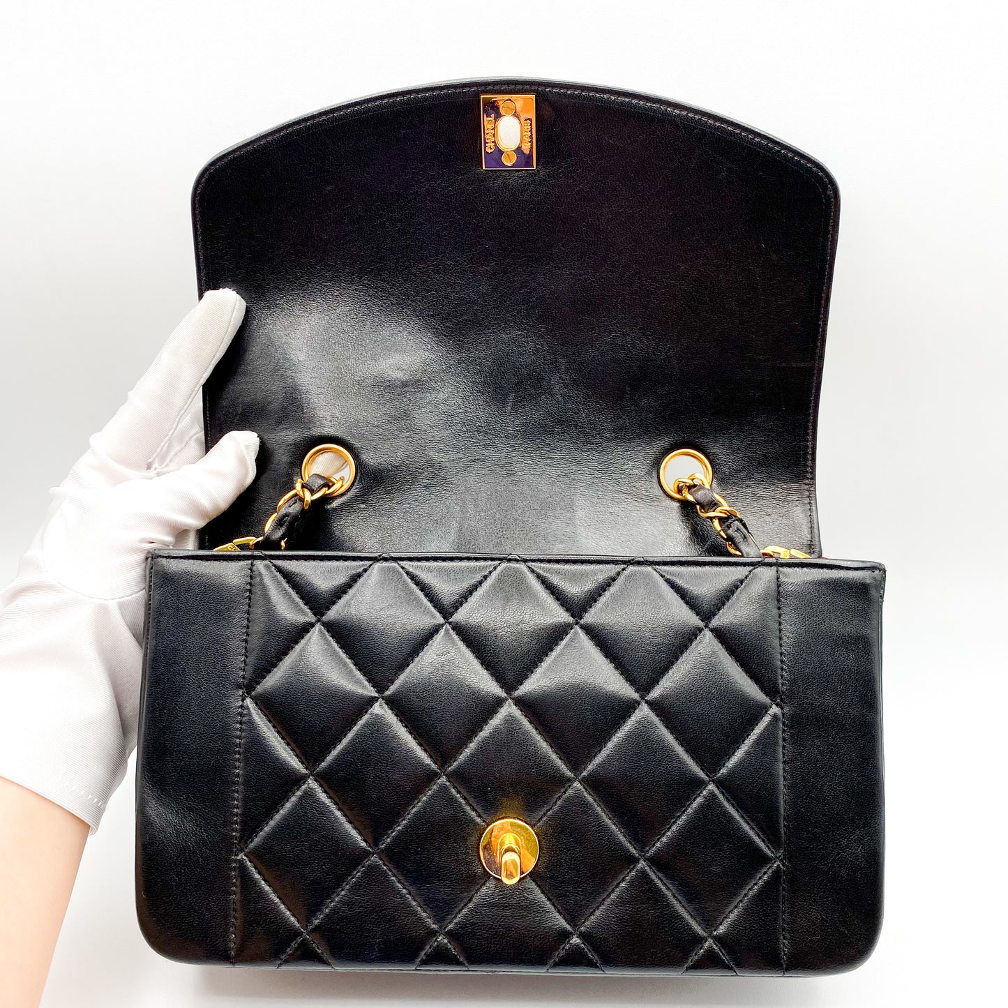 Henrik, Vintage Authentic Chanel 3 series small black lambskin diana with seal only