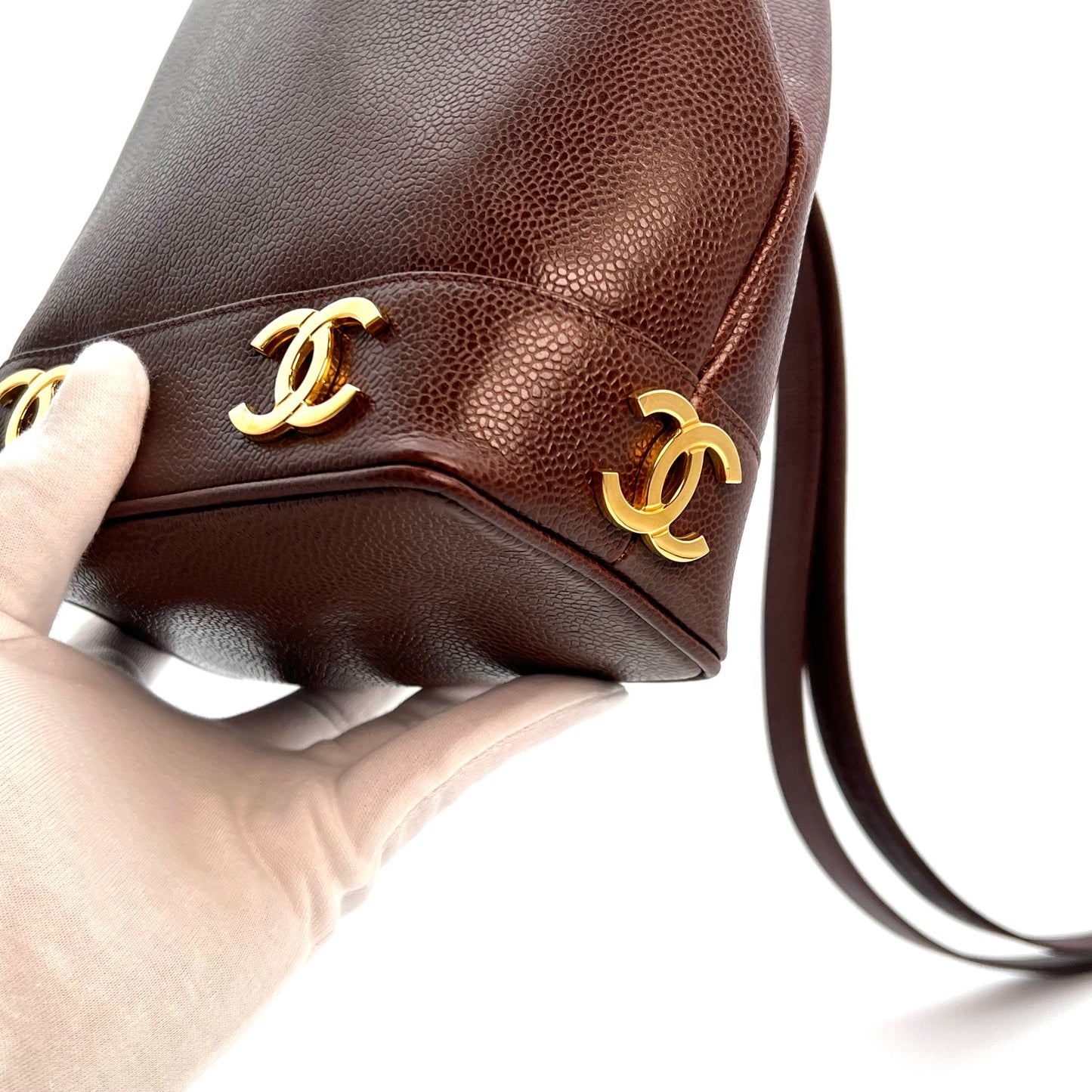 Tripp, 3 Series Brown caviar bucket bag with seal and card