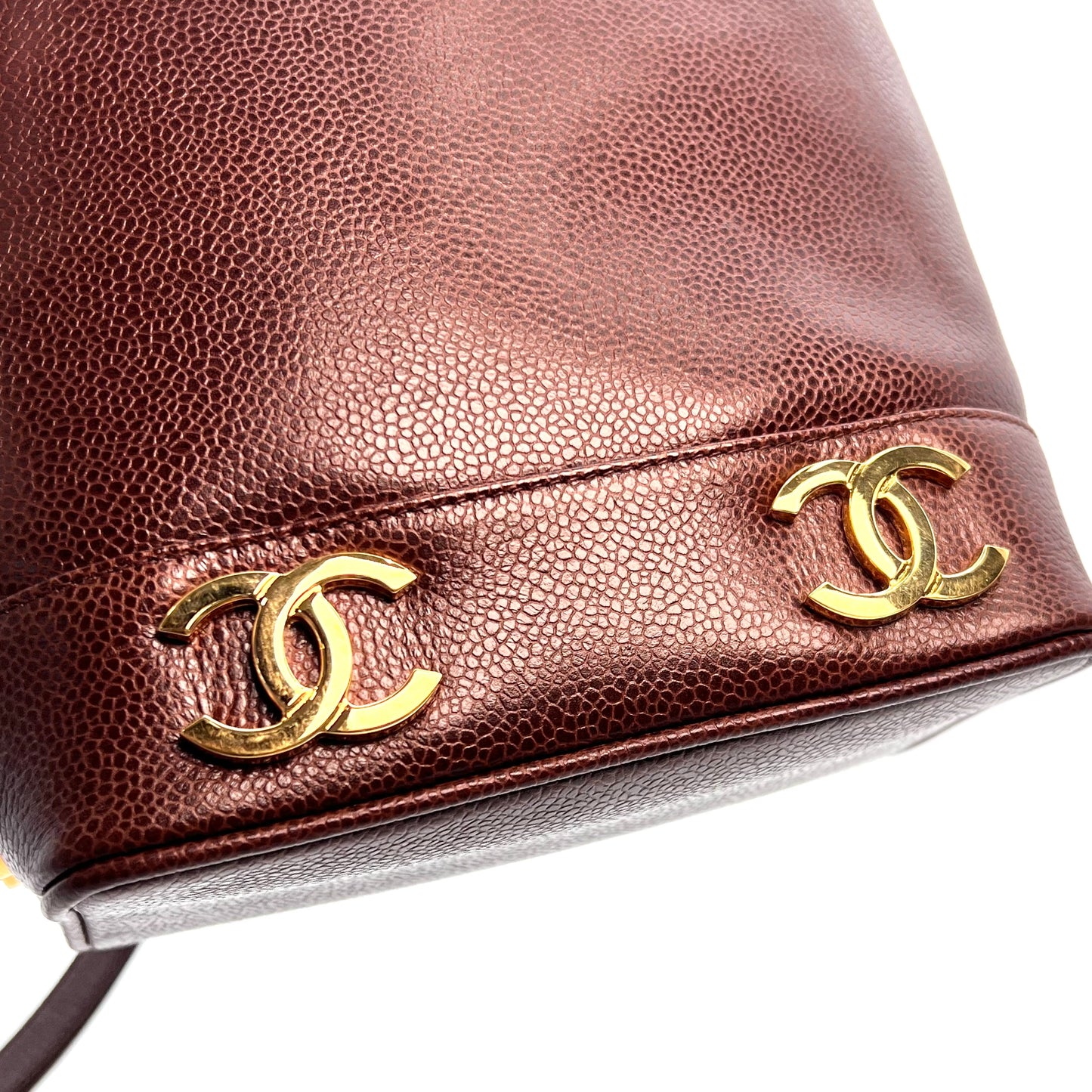 Tripp, 3 Series Brown caviar bucket bag with seal and card