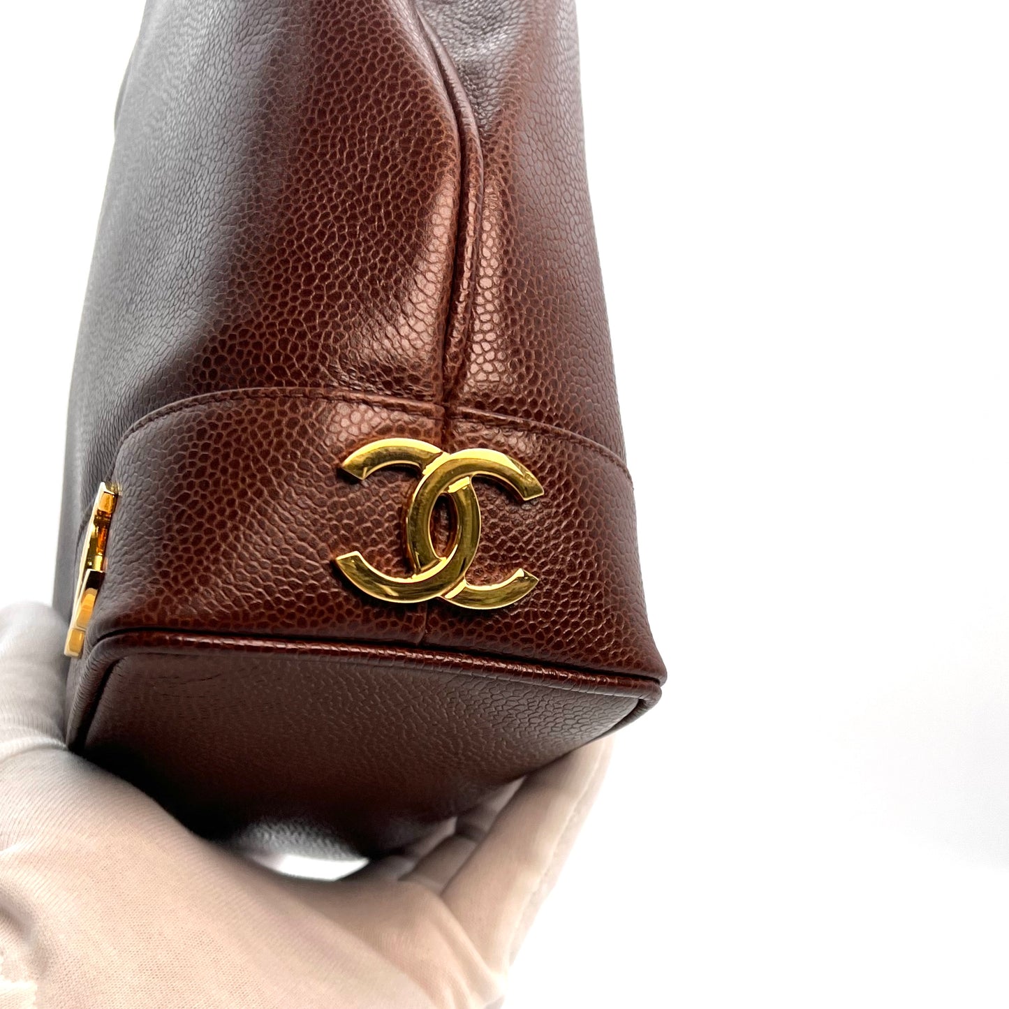 Tripp, 3 Series Brown caviar bucket bag with seal and card