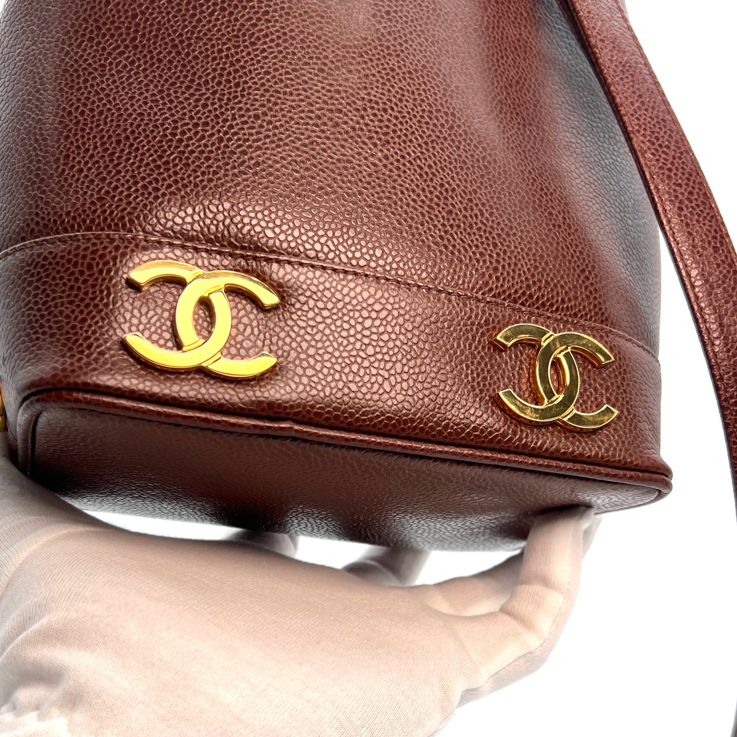 Tripp, 3 Series Brown caviar bucket bag with seal and card