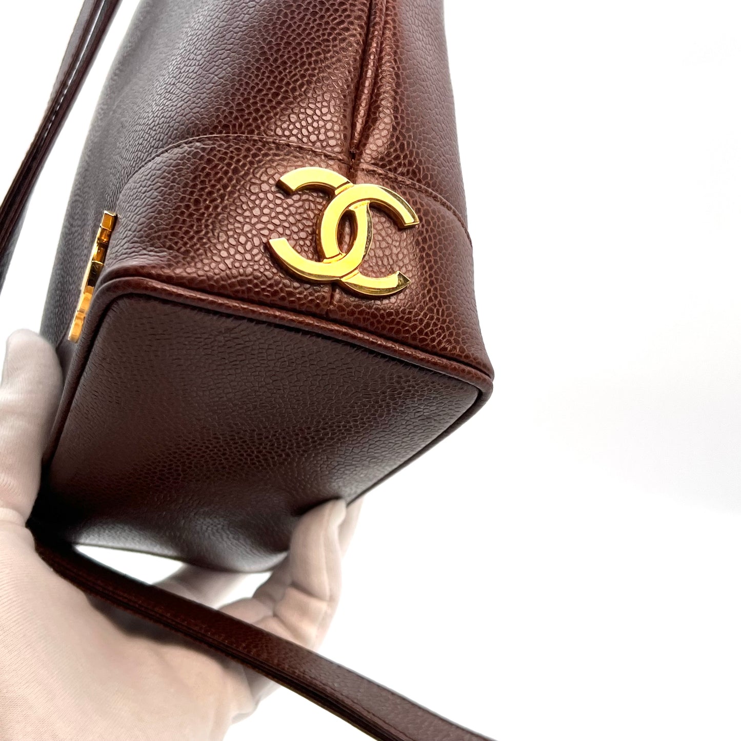 Tripp, 3 Series Brown caviar bucket bag with seal and card
