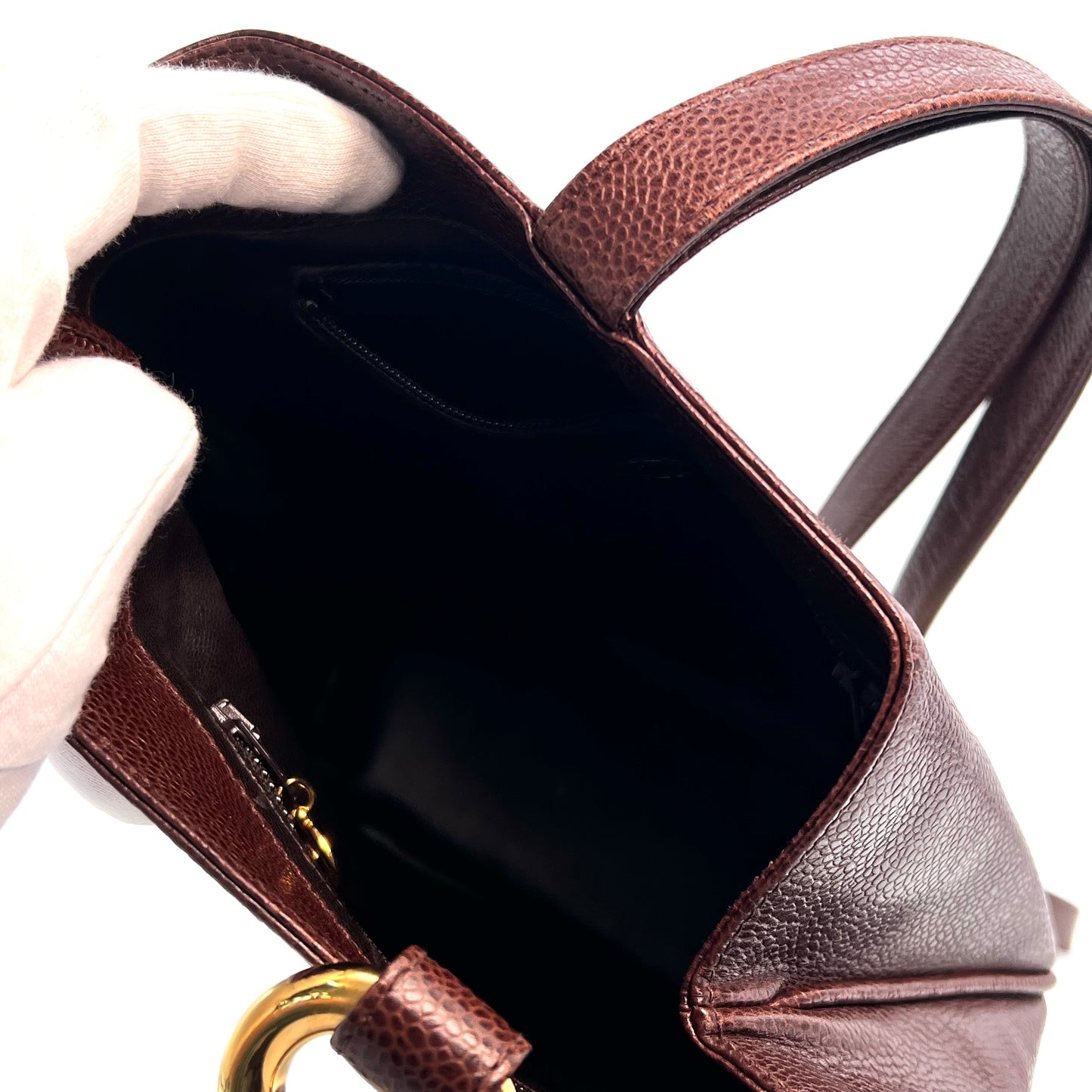 Tripp, 3 Series Brown caviar bucket bag with seal and card
