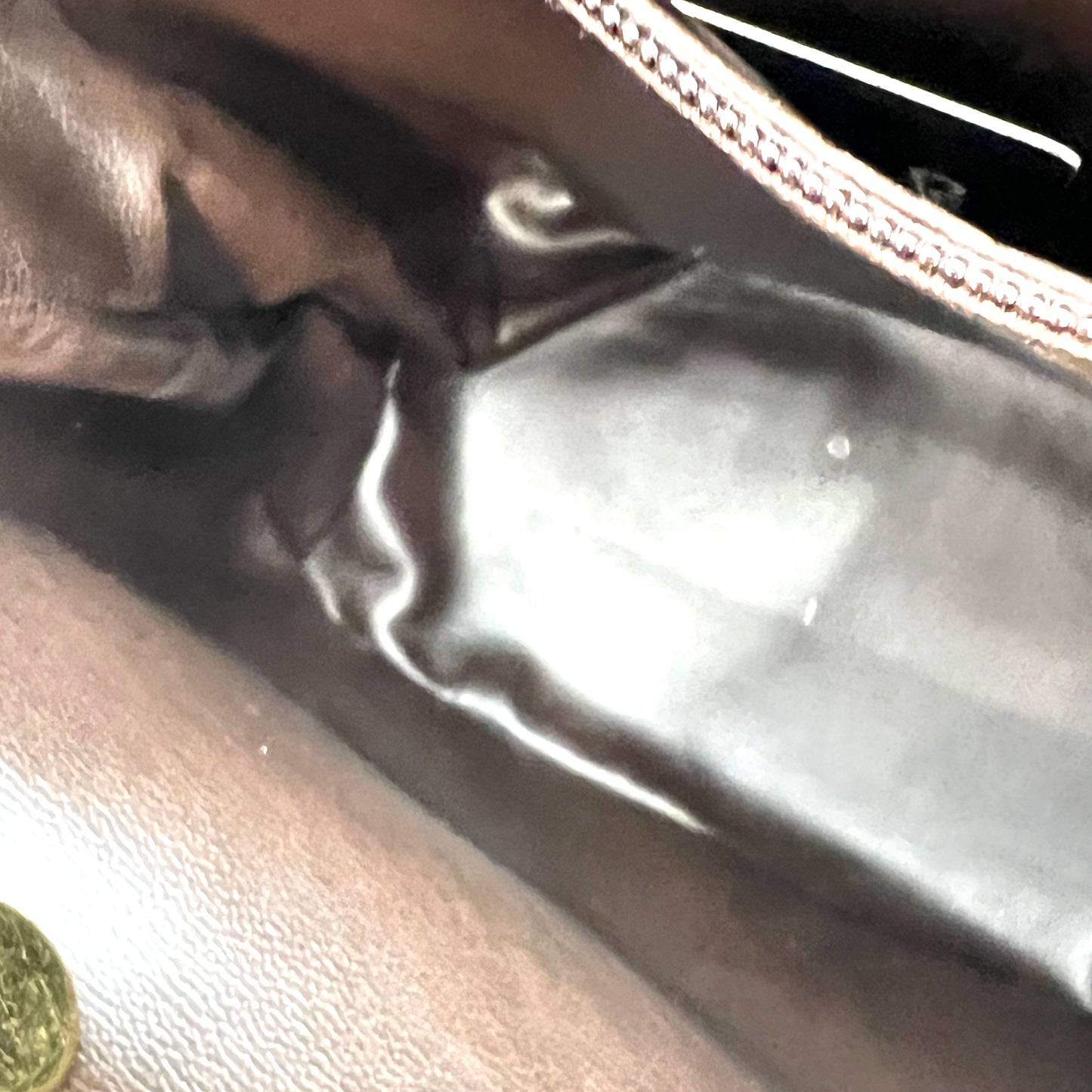 Tripp, 3 Series Brown caviar bucket bag with seal and card