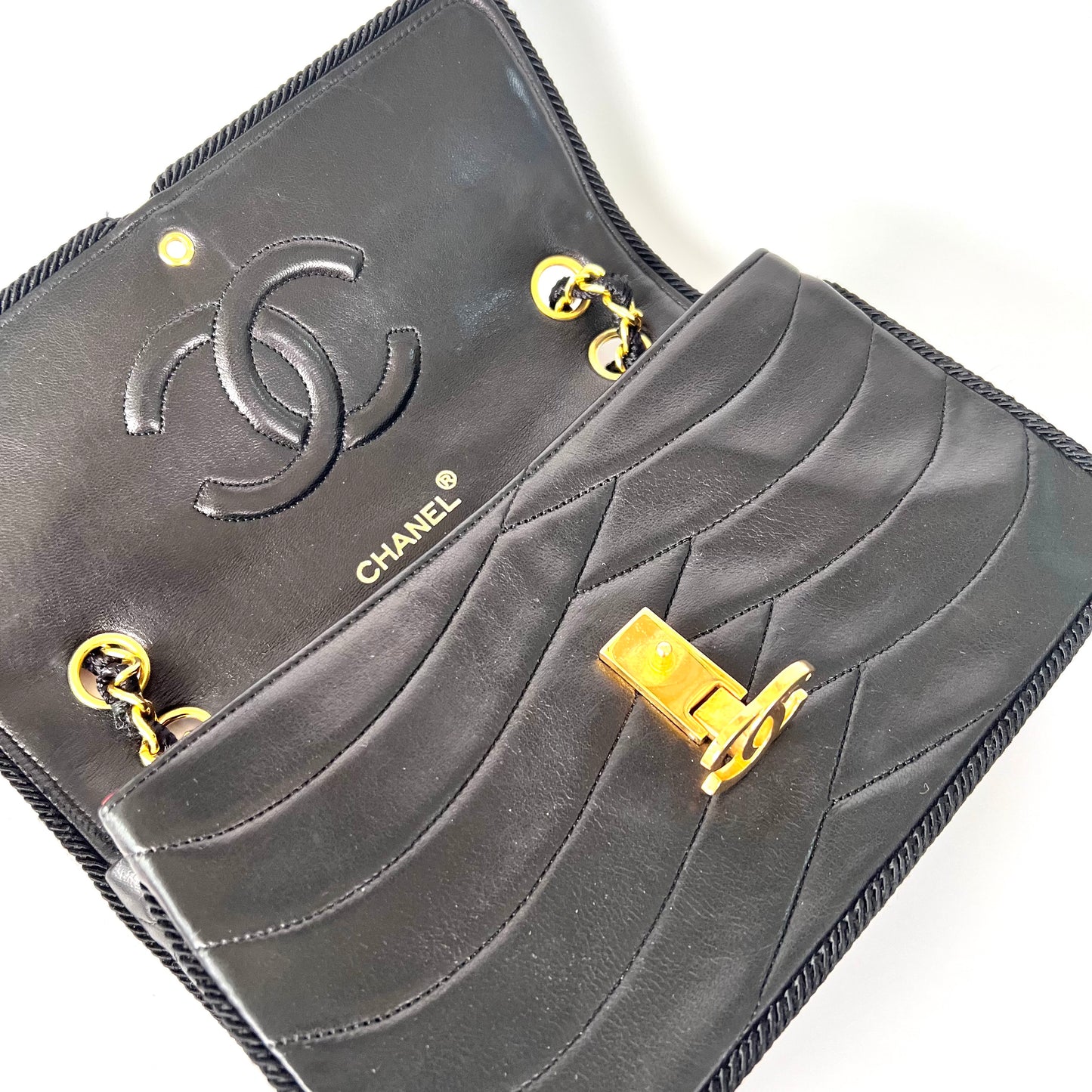 Taha, 0 Series Wave stitch black lambskin rope single flap with seal only