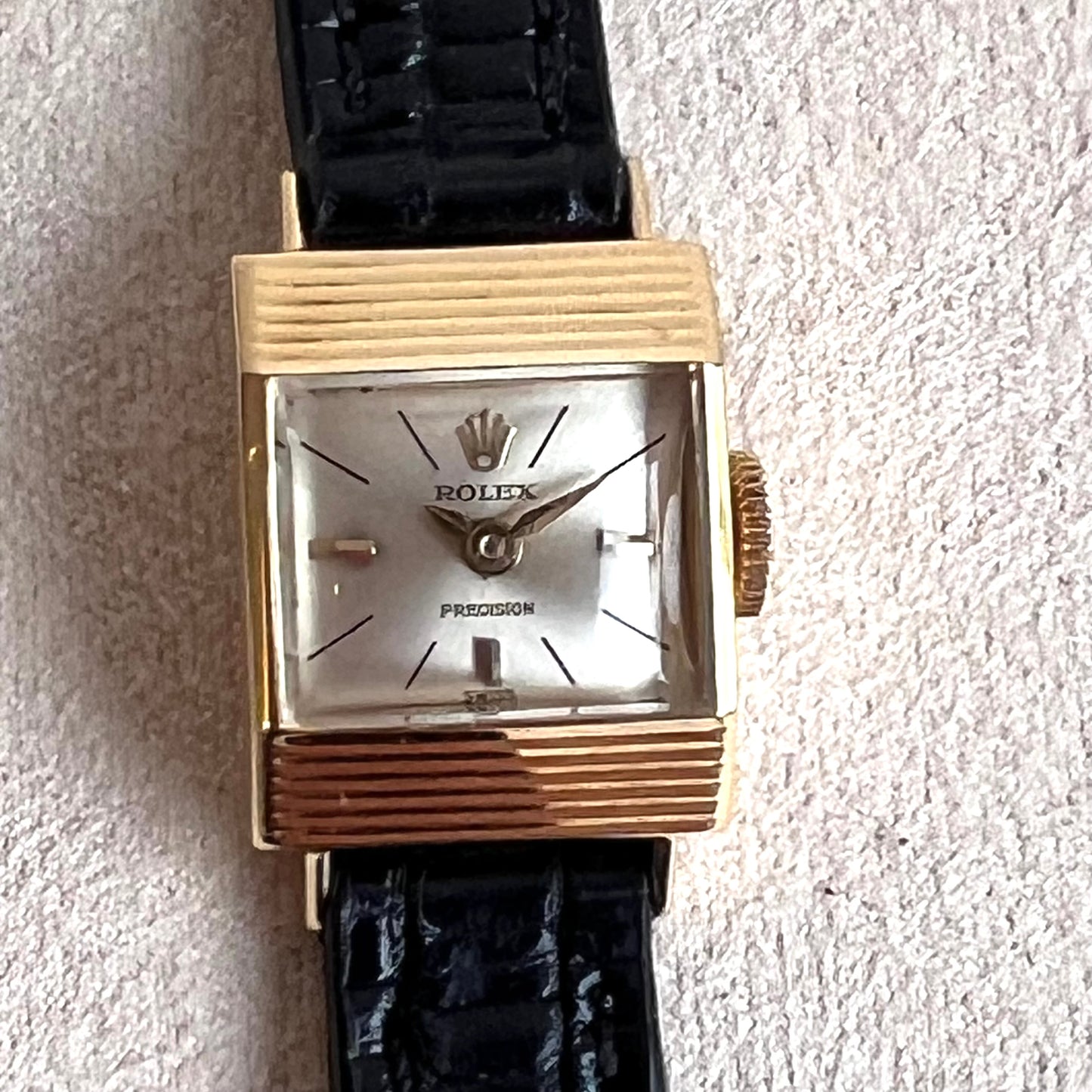 Rolex Precision 18k, step cut case w/ black strap