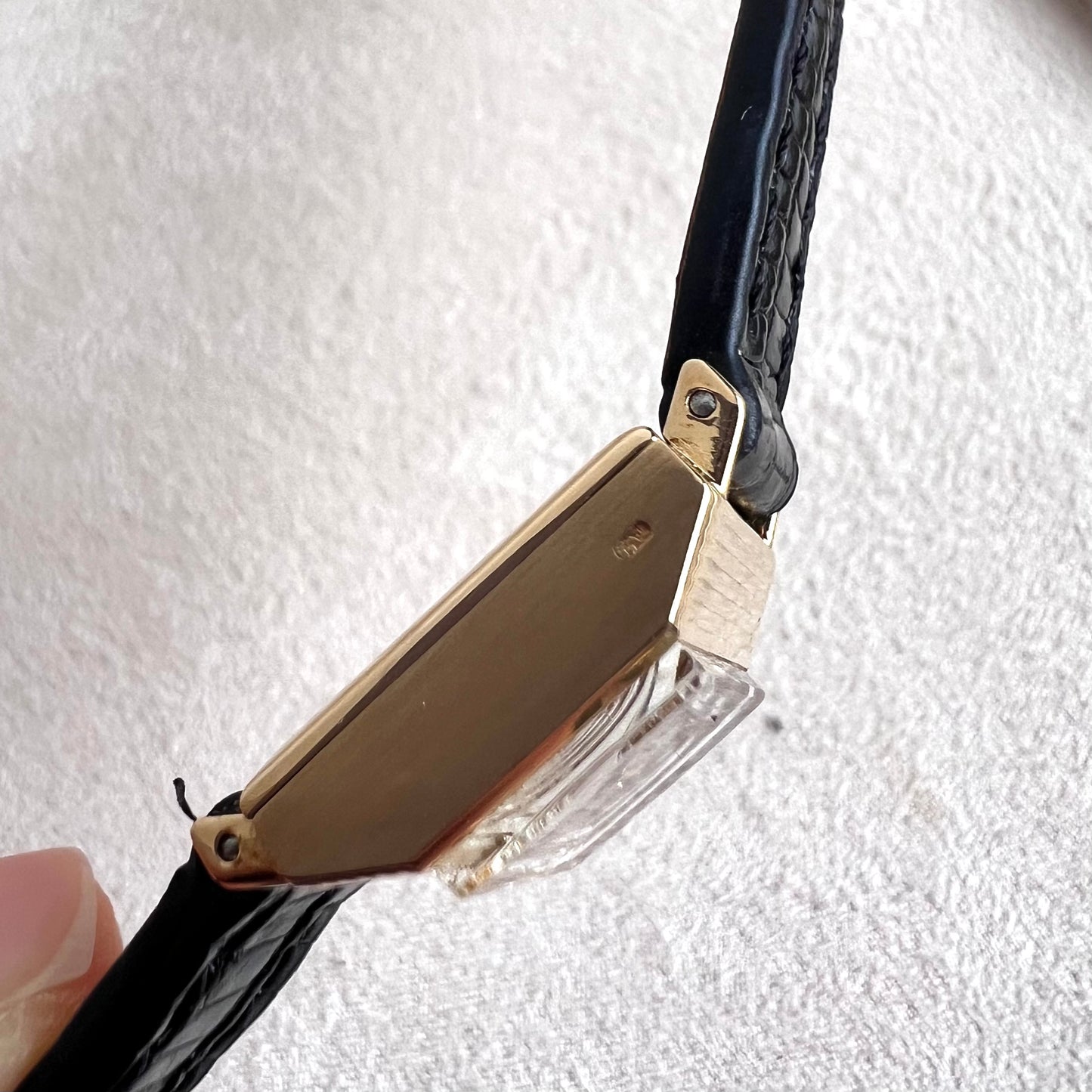 Rolex Precision 18k, step cut case w/ black strap