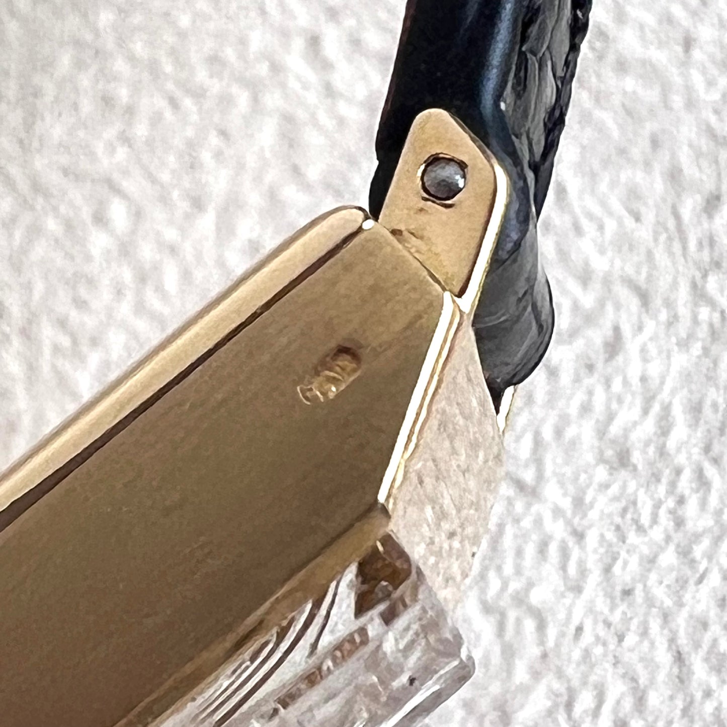 Rolex Precision 18k, step cut case w/ black strap