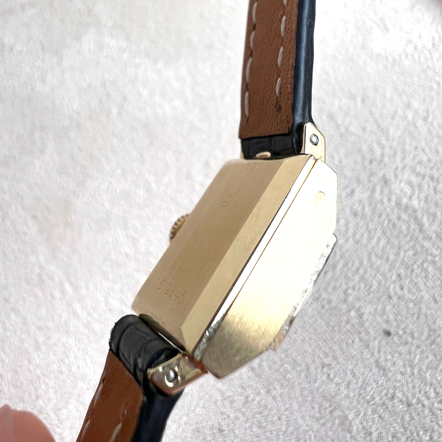 Rolex Precision 18k, step cut case w/ black strap