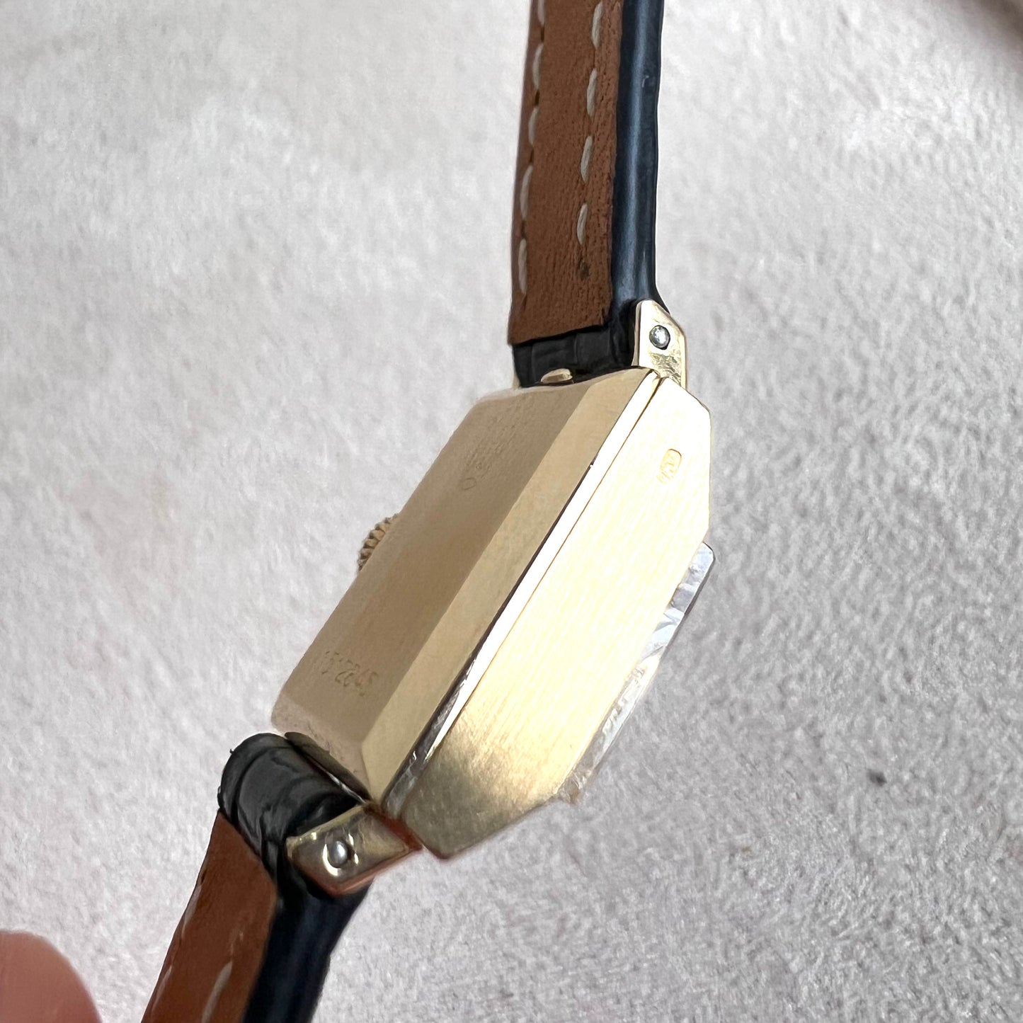 Rolex Precision 18k, step cut case w/ black strap
