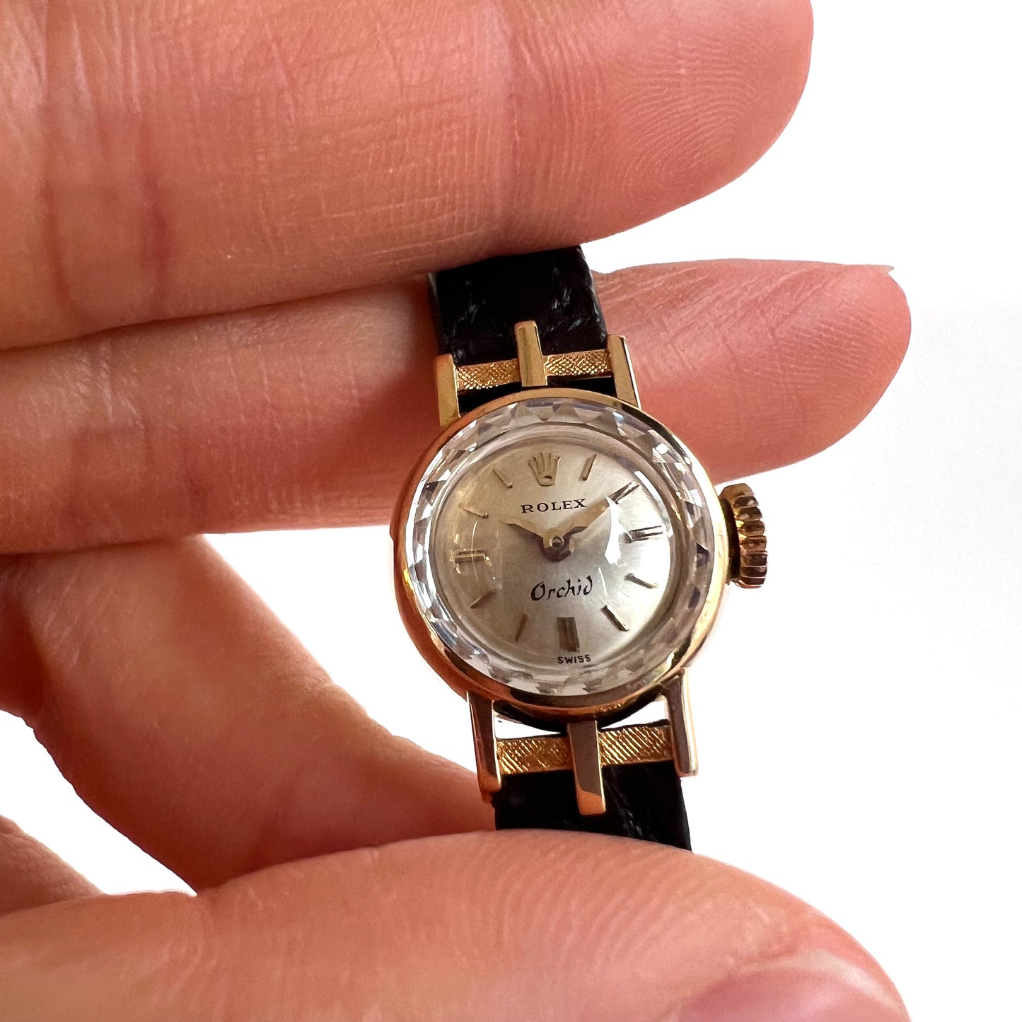 Rolex Orchid 18k, etched lugs w/ black strap