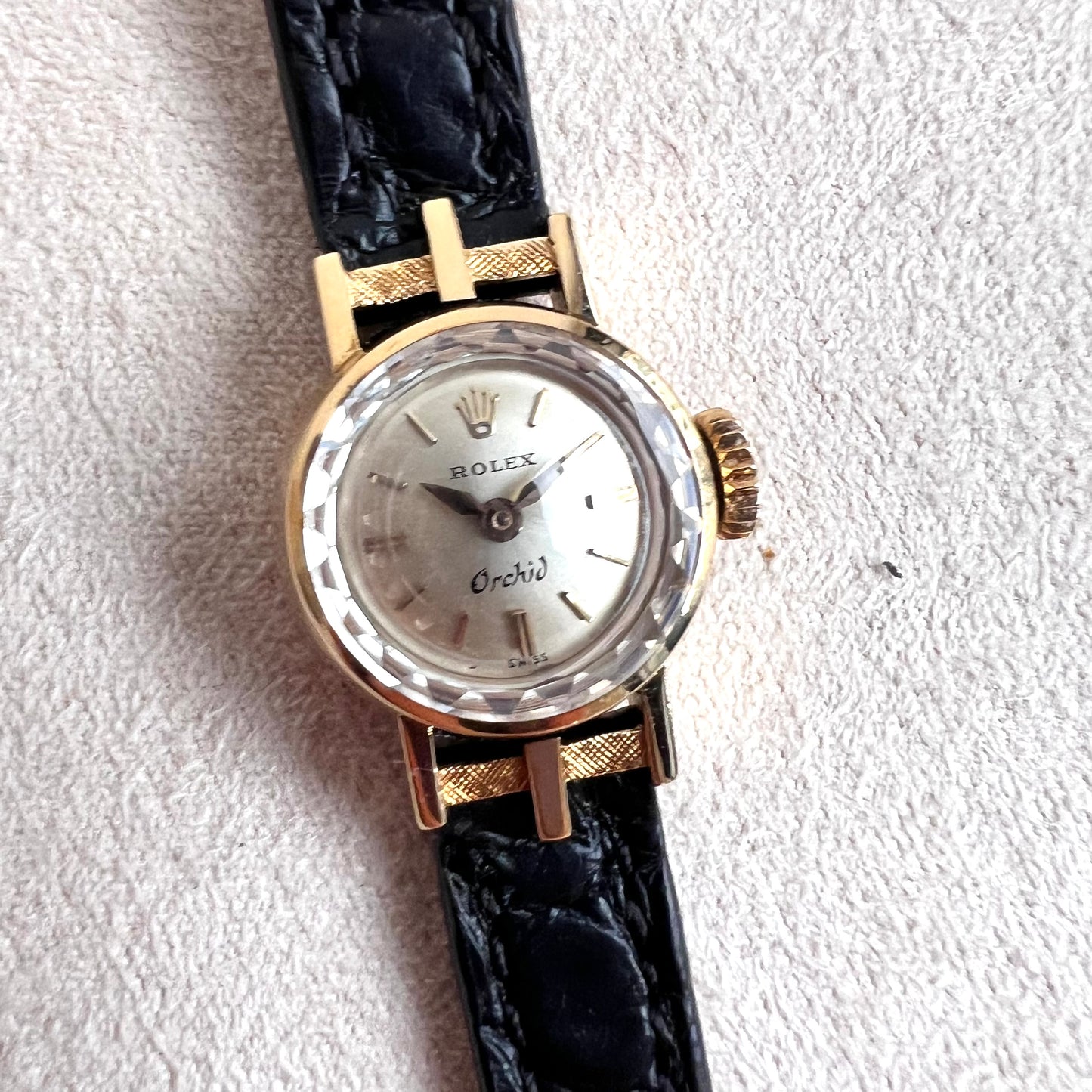 Rolex Orchid 18k, etched lugs w/ black strap