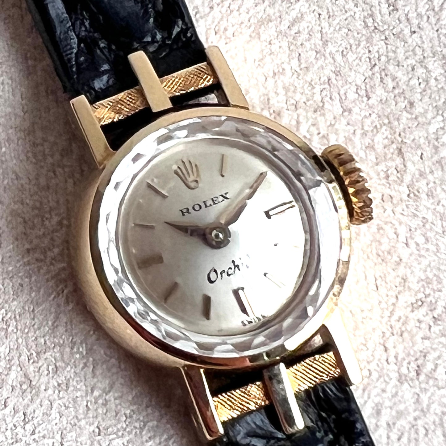 Rolex Orchid 18k, etched lugs w/ black strap