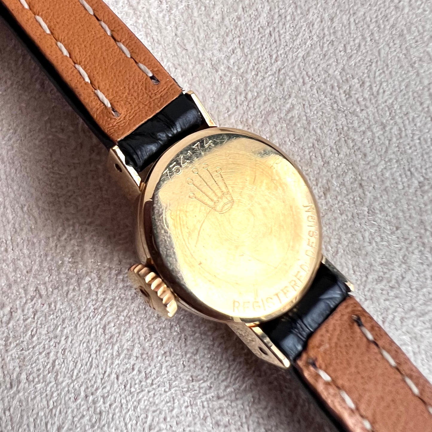 Rolex Orchid 18k, etched lugs w/ black strap