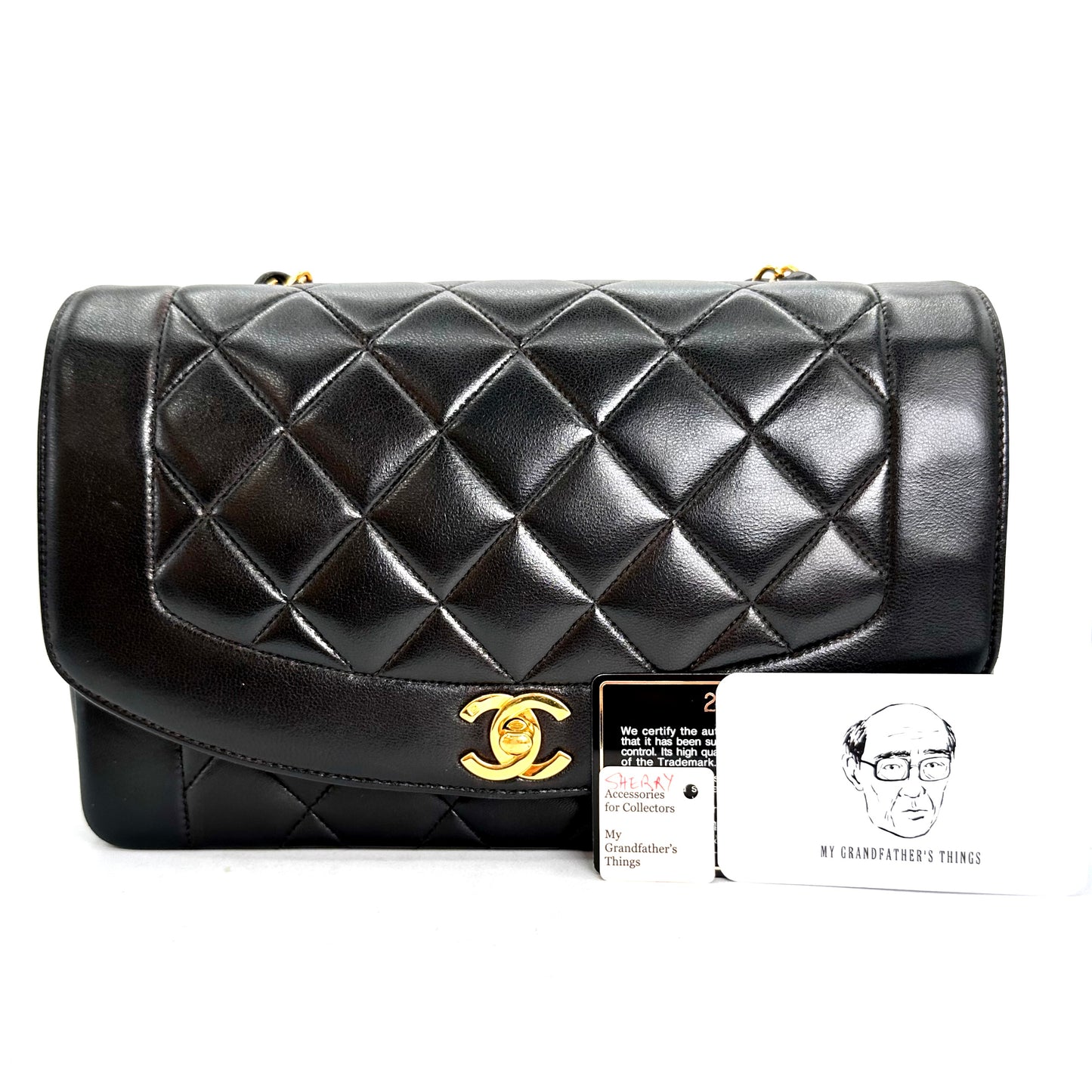 Sherry, Vintage Authentic Chanel 2 series medium black lambskin diana with seal and card