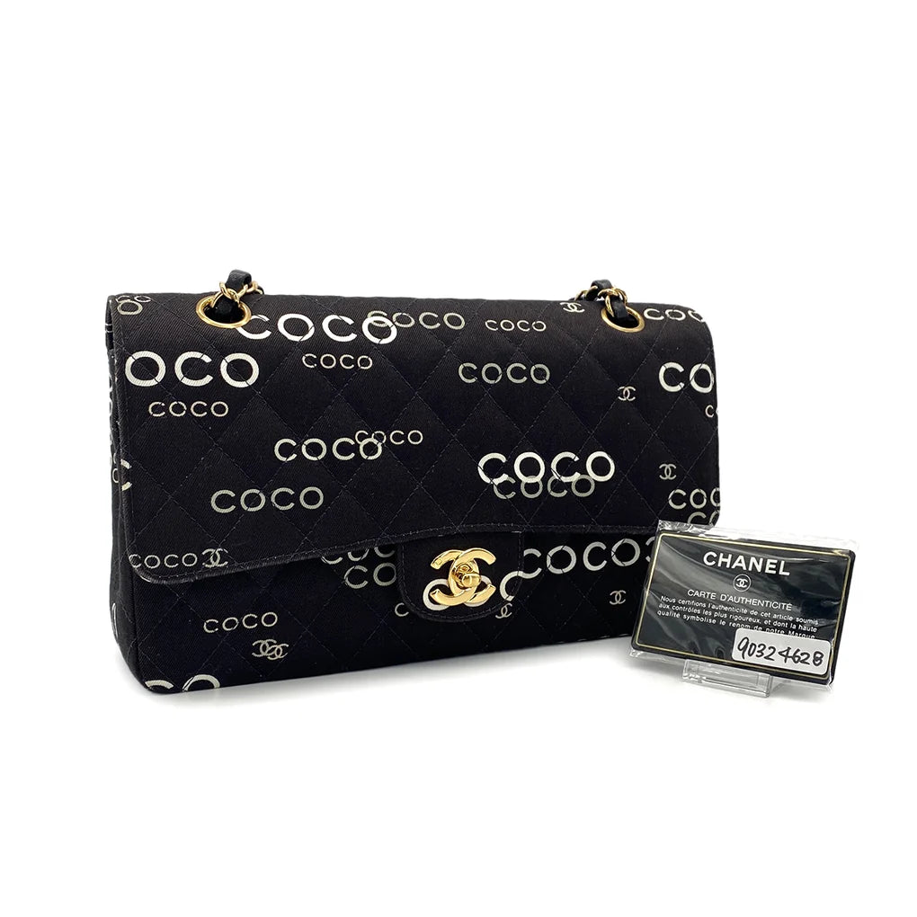 Evienne, 7 Series Coco Print Black Canvas Gold  Hardware with seal and card