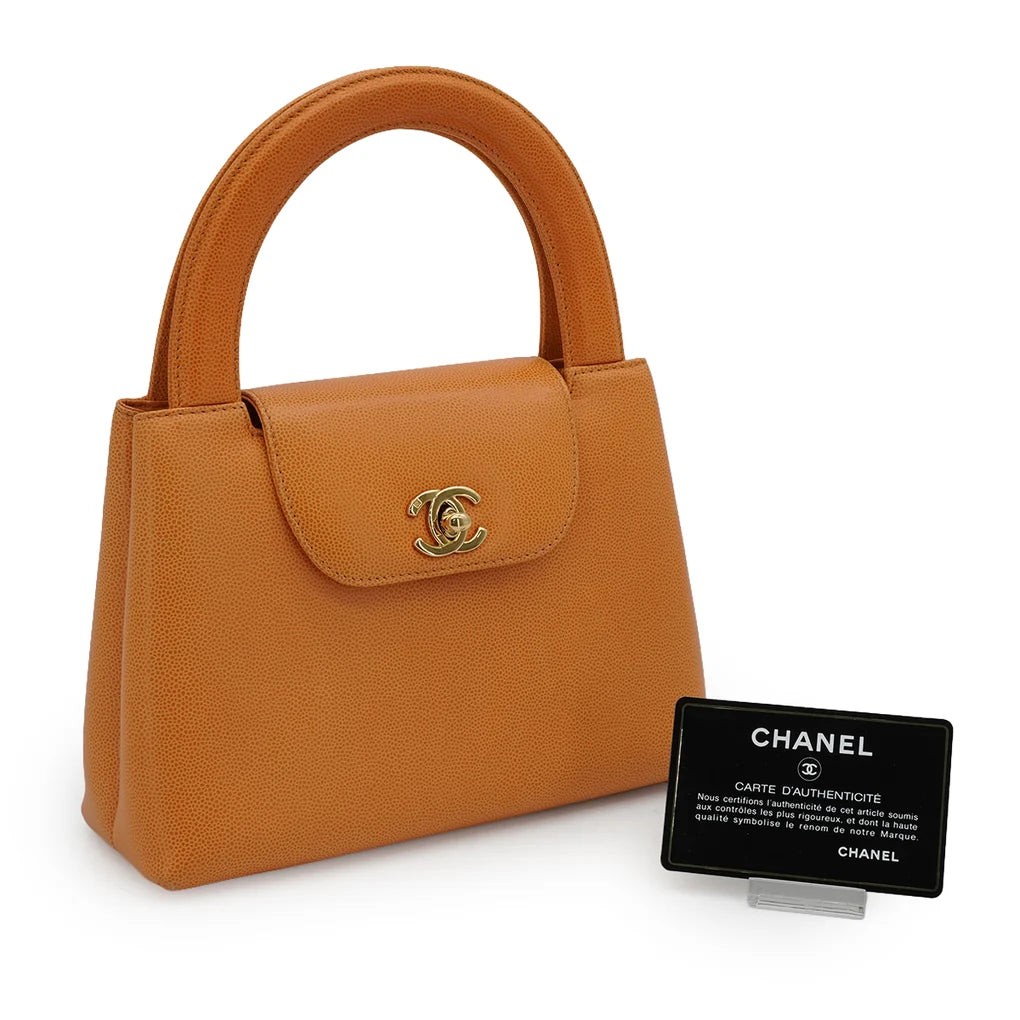 Dorian, 5 Series Orange Caviar Gold Hardware with seal and card