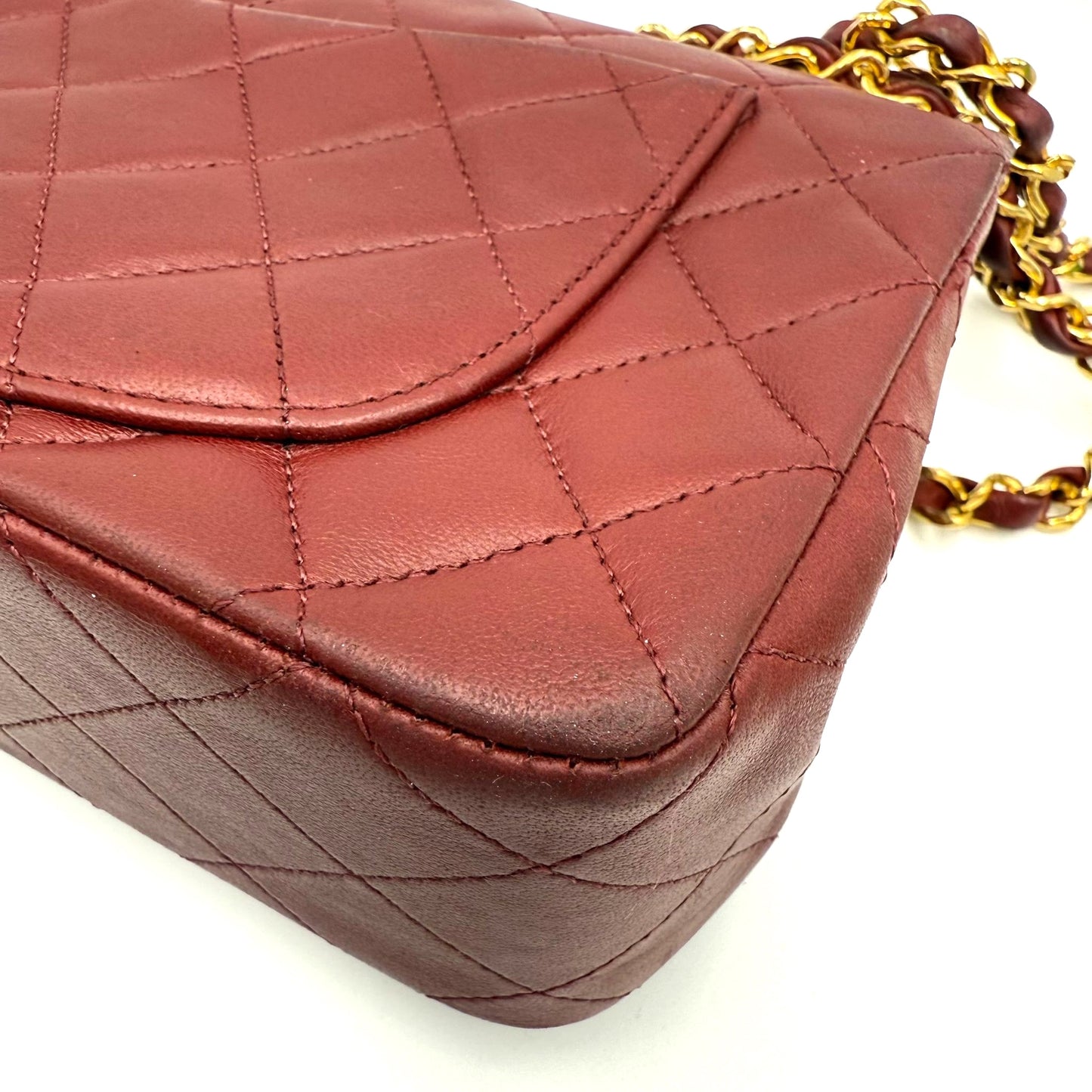 Dahlia, 1 series small classic flap burgundy lambskin with contrast black lining seal and card